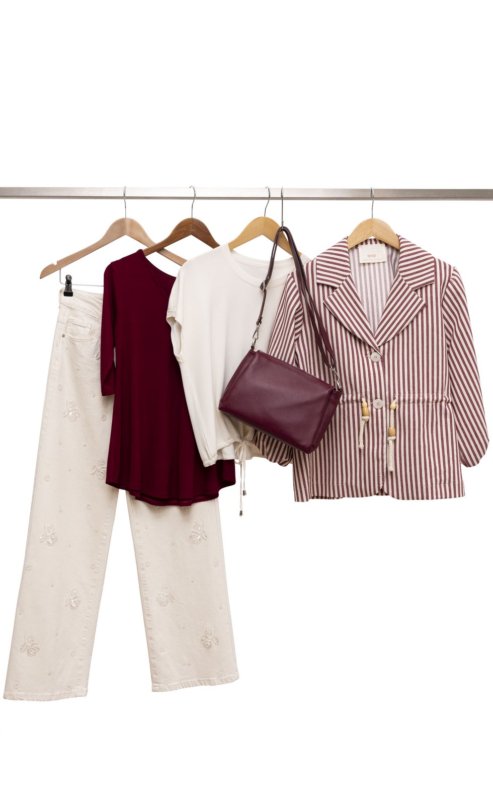 Fioretta Jeans: € 99,- Shirt: € 39,- Pulli: € 69,- Ledertasche: € 99,- Jacke: € 149,-